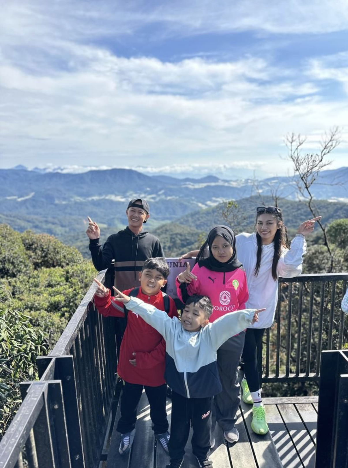 Family at mountain viewpoint Cameron Highlands